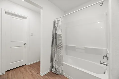a bathroom with a bathtub