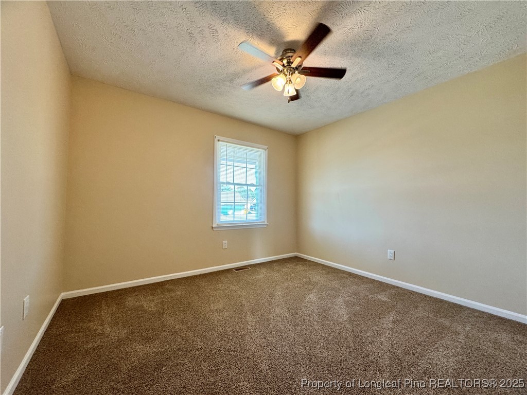 127 Nantahala Drive Linden, NC 28356 - Photo 14 of 22 an empty room with a window