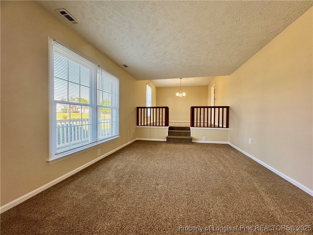 127 Nantahala Drive Linden, NC 28356 - Photo 3 of 22 an empty room with windows