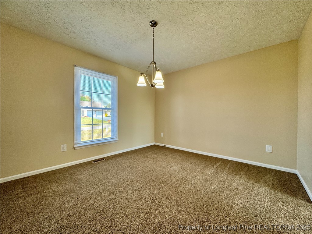 127 Nantahala Drive Linden, NC 28356 - Photo 5 of 22 a view of a room with window and ceiling fan