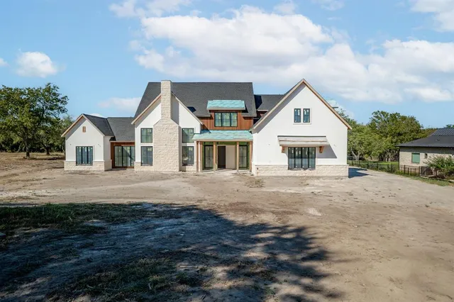 a view of house with outdoor space