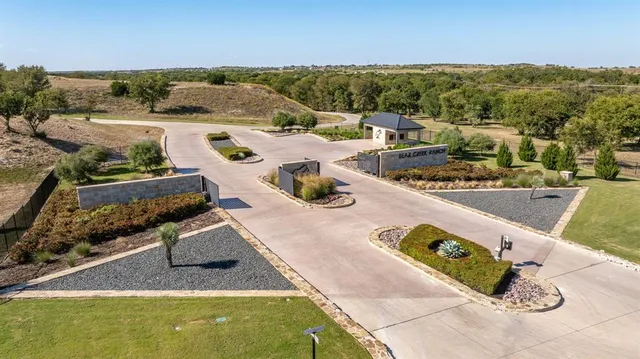 a view of a swimming pool with lounge chairs