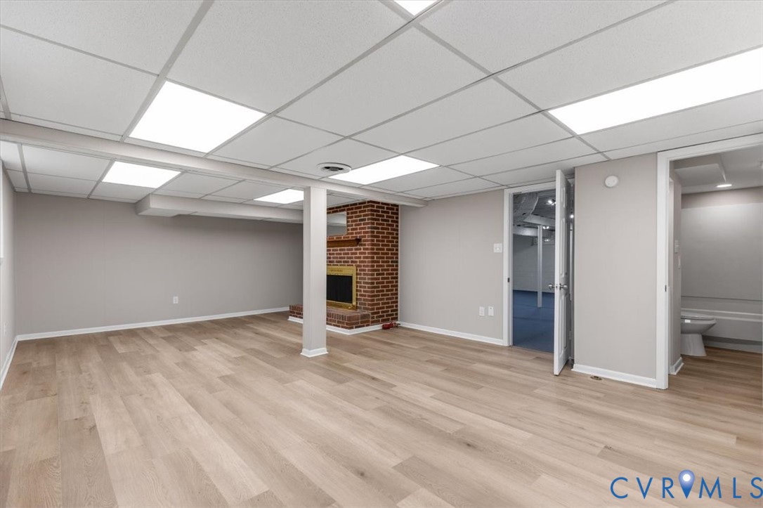 3308 Sylvania Road Chester, VA 23831 - Photo 38 of 55 Spacious room featuring wood-finish flooring, a br