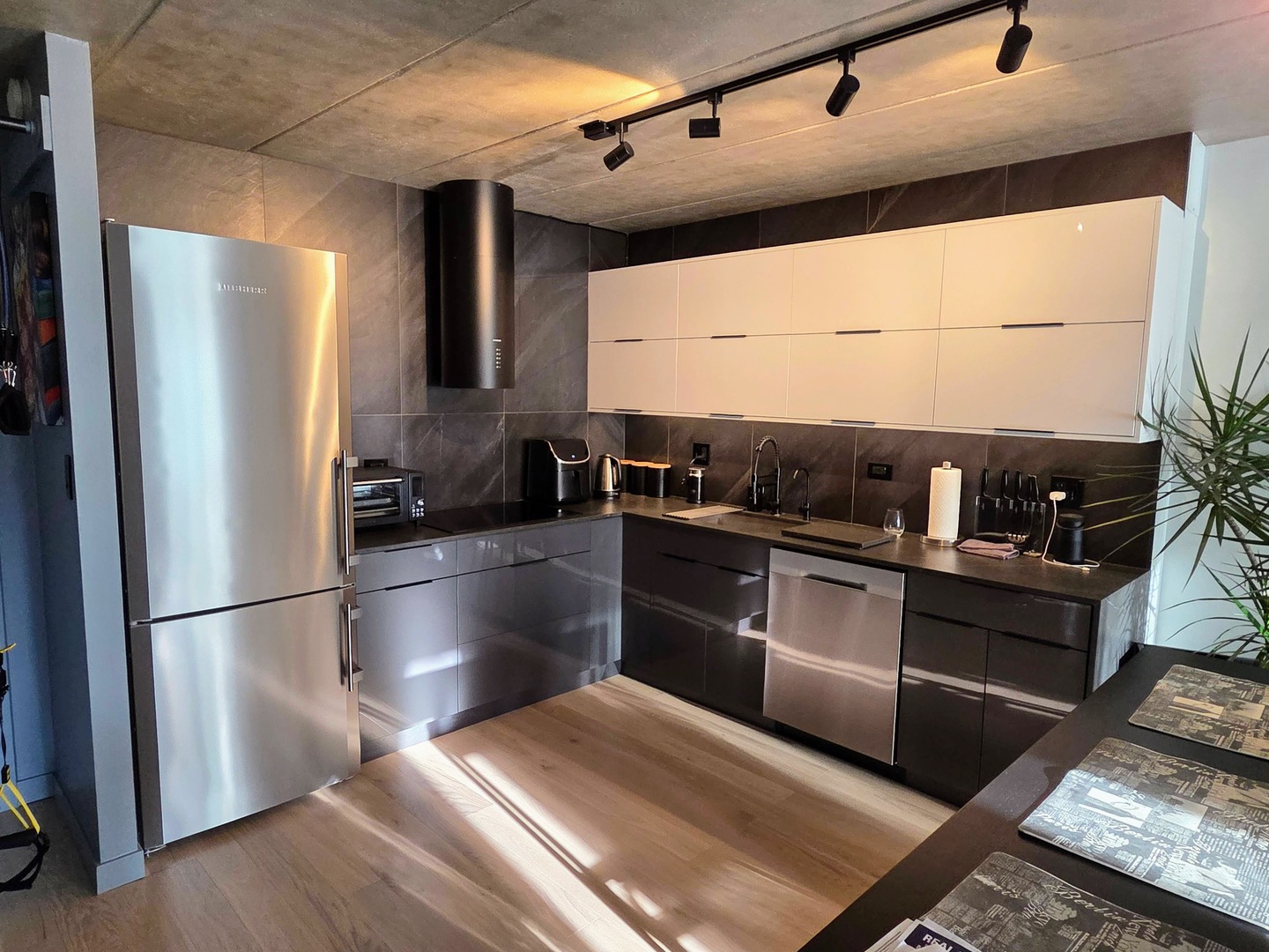 9701 North Dee Road, Unit 2G Niles, IL 60714 - Photo 6 of 18 a kitchen with stainless steel appliances kitchen island granite countertop a refrigerator and a stove