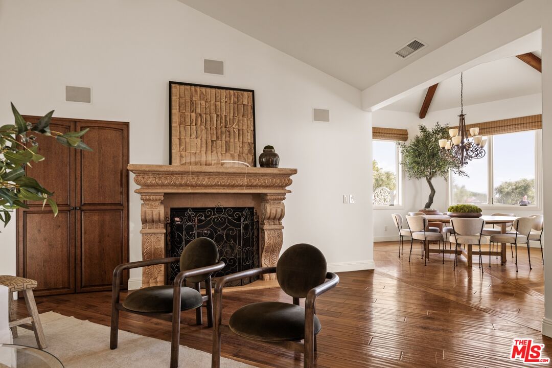 2370 North Refugio Road Santa Ynez, CA 93460 - Photo 11 of 66 a living room with furniture and a fireplace