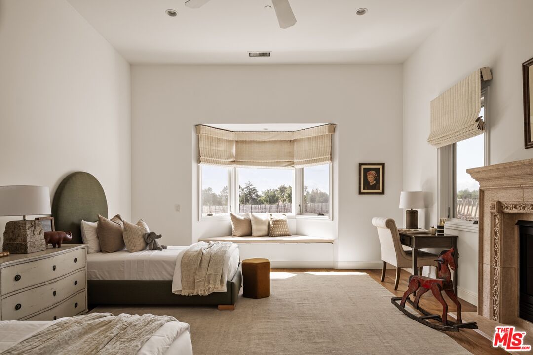 2370 North Refugio Road Santa Ynez, CA 93460 - Photo 24 of 66 a living room with furniture and a large window