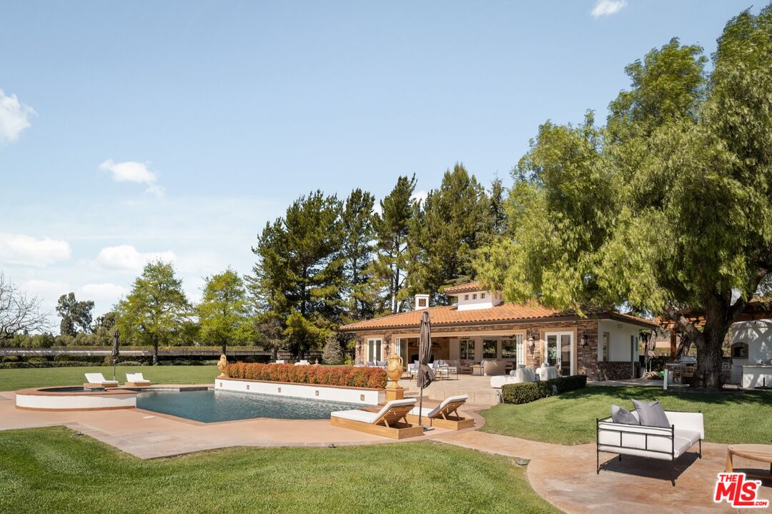 2370 North Refugio Road Santa Ynez, CA 93460 - Photo 32 of 66 a view of a house with swimming pool and sitting area