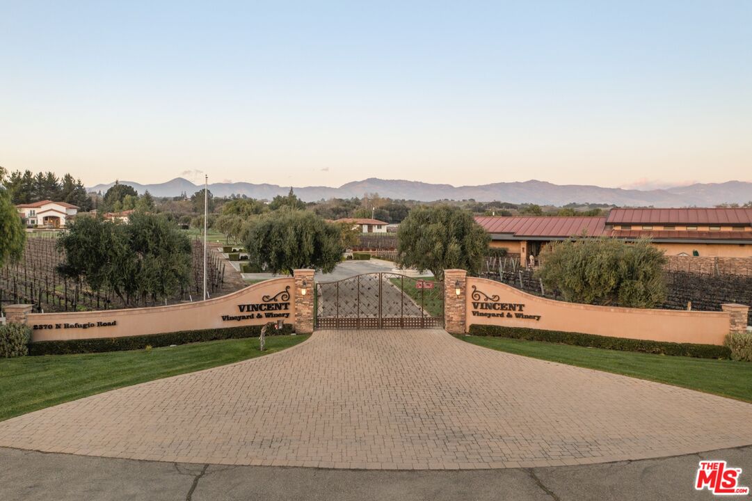 2370 North Refugio Road Santa Ynez, CA 93460 - Photo 55 of 66 a view of a terrace with yard and mountain view in back