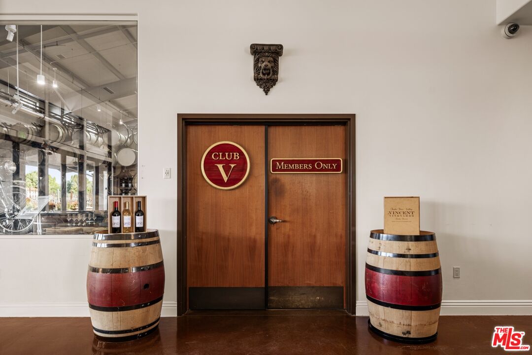 2370 North Refugio Road Santa Ynez, CA 93460 - Photo 58 of 66 a room with furniture and a potted plant
