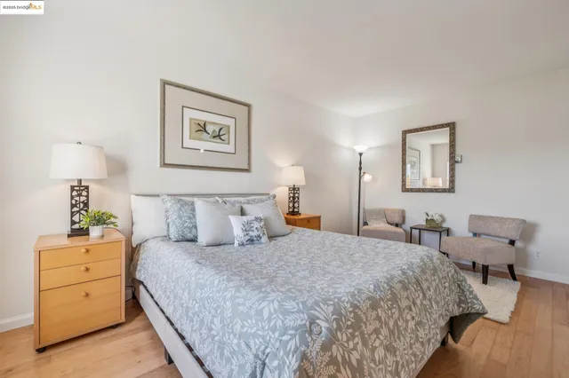 a bathroom with a sink a large mirror and shower