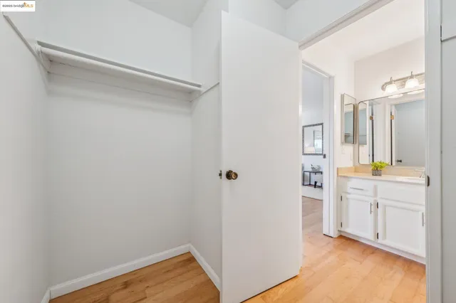 a bedroom with a bed and a table in it