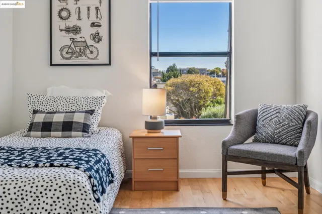 a white car parked in front of a house