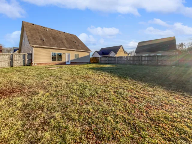 a view of house with garden space