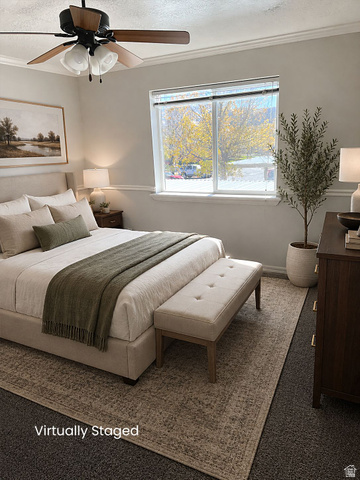 8198 North Cedar Springs Road, Unit T6 Eagle Mountain, UT 84005 - Photo 3 of 13 Spacious room featuring a ceiling fan with integrated lighting, a large window, crown molding, and neutral wall tones