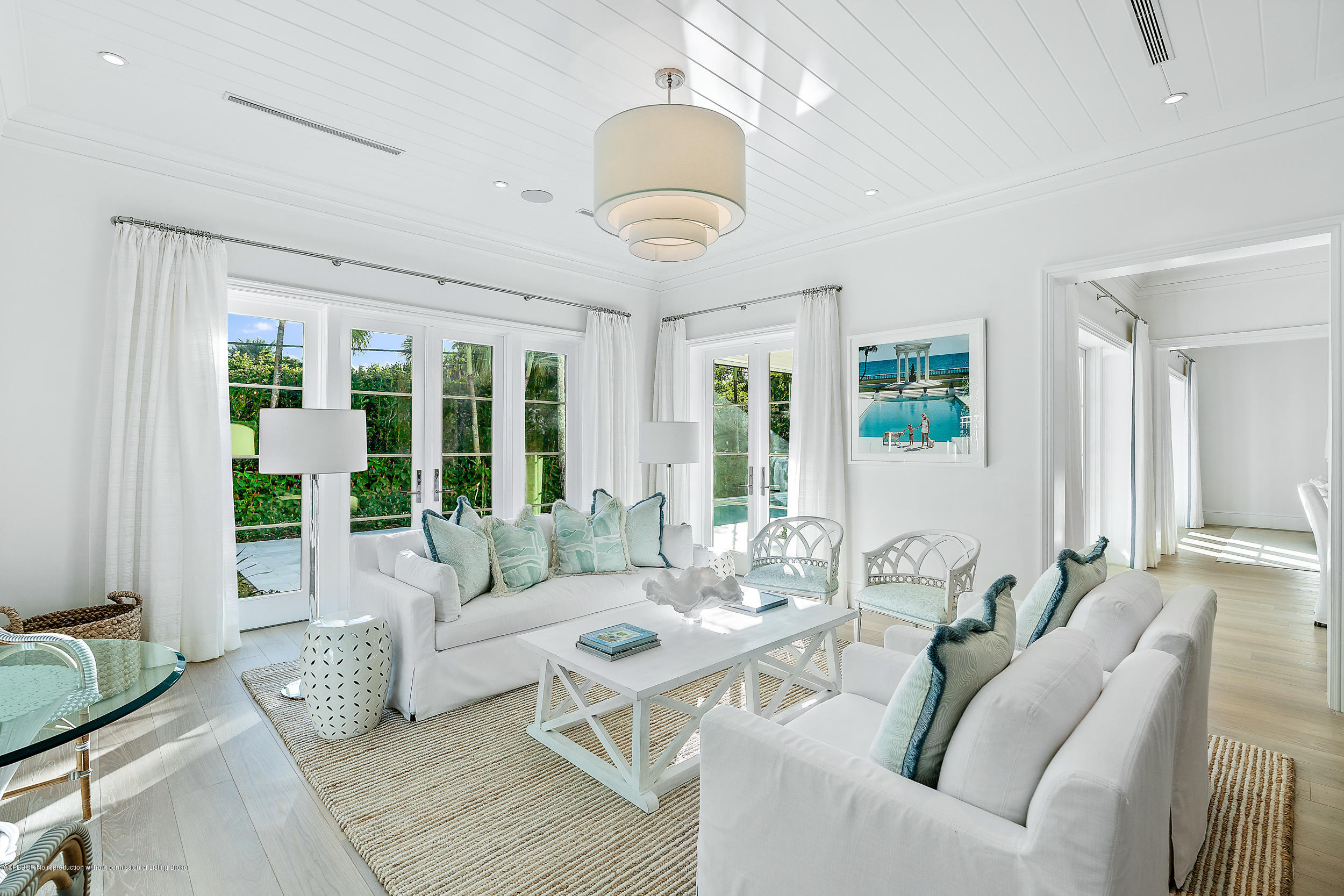 140 Kings Road Palm Beach, FL 33480 - Photo 15 of 42 a living room with furniture and a large window