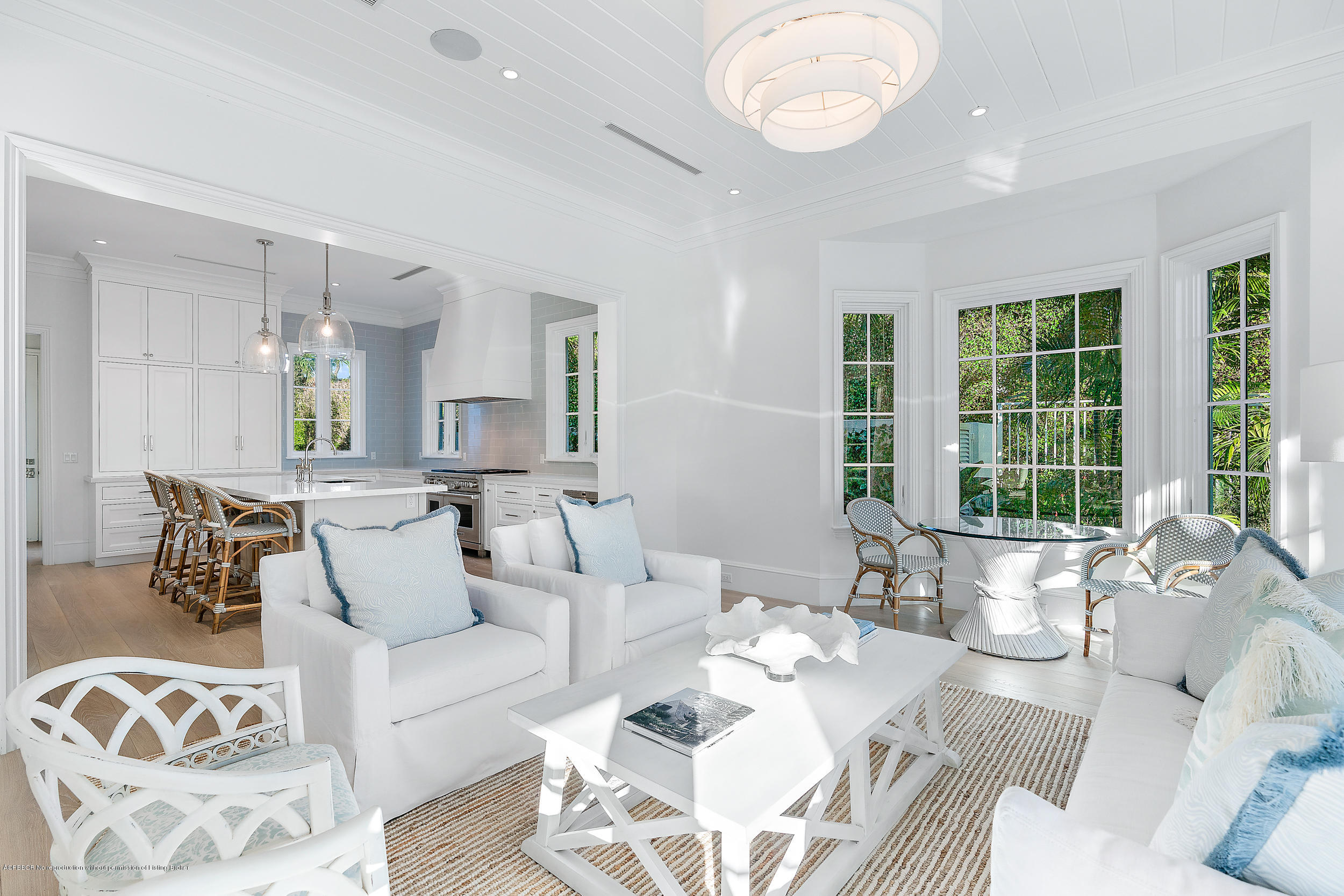 140 Kings Road Palm Beach, FL 33480 - Photo 17 of 42 a living room with furniture and a large window