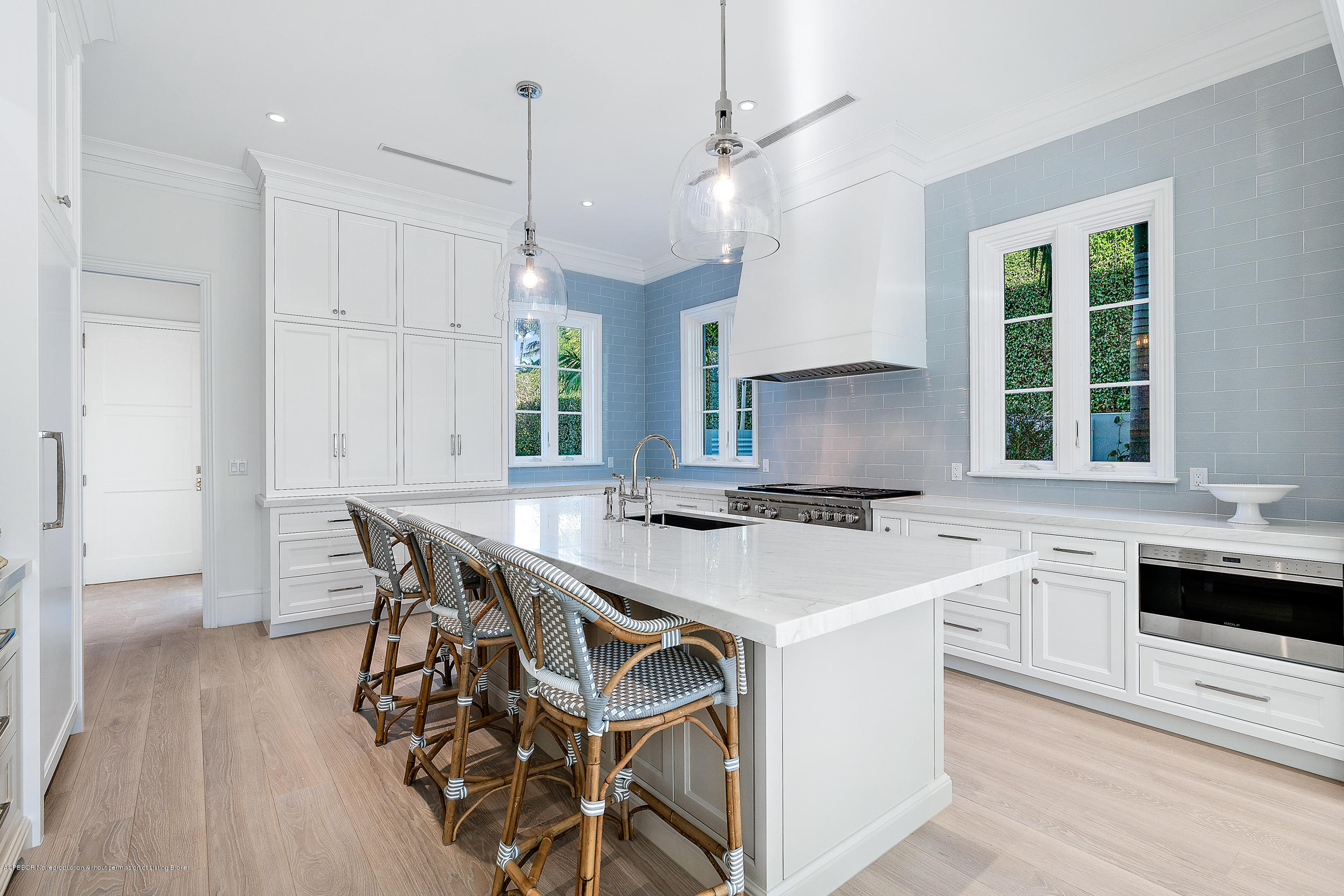 140 Kings Road Palm Beach, FL 33480 - Photo 18 of 42 a kitchen with a stove a sink and a refrigerator
