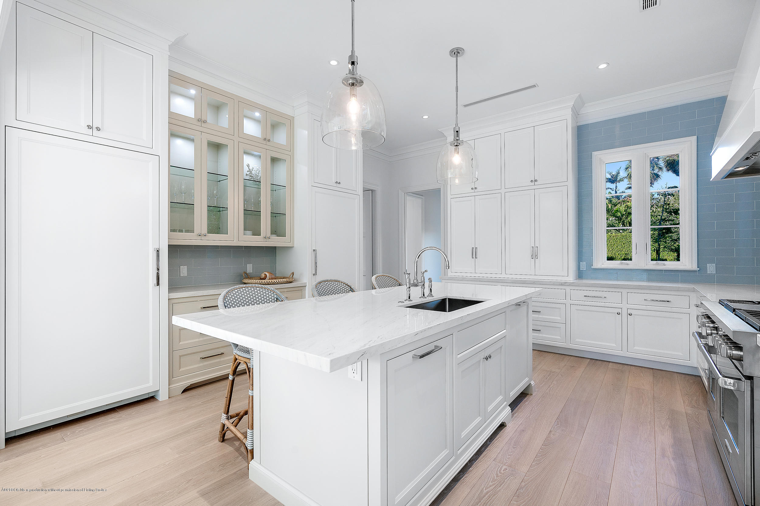 140 Kings Road Palm Beach, FL 33480 - Photo 20 of 42 a kitchen with a sink stove and cabinets