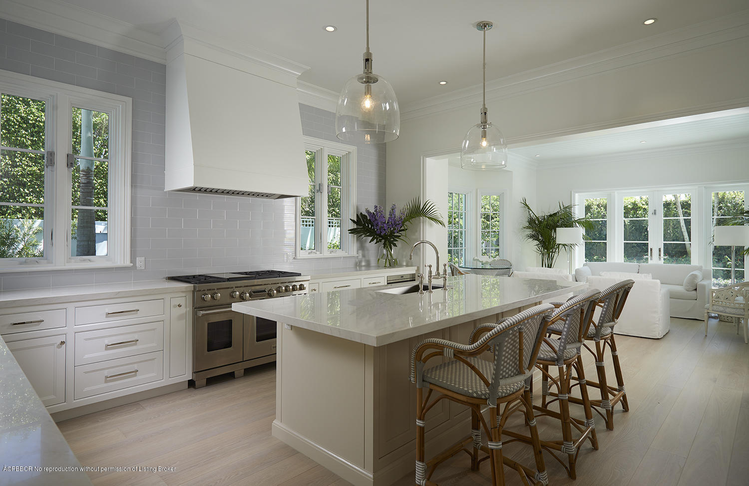 140 Kings Road Palm Beach, FL 33480 - Photo 21 of 42 a kitchen with stainless steel appliances granite countertop a stove a sink and a refrigerator