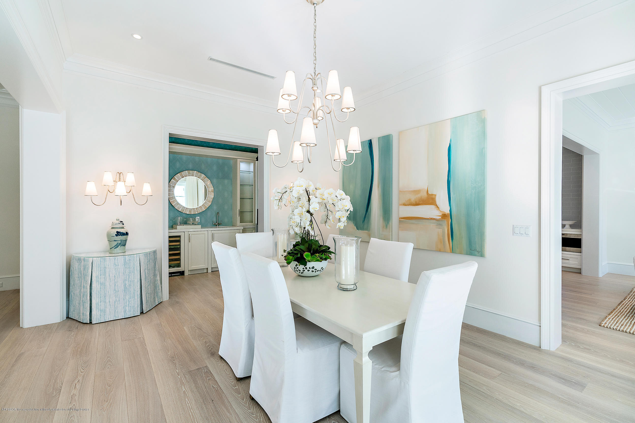 140 Kings Road Palm Beach, FL 33480 - Photo 30 of 42 a view of a dining room with furniture and wooden floor