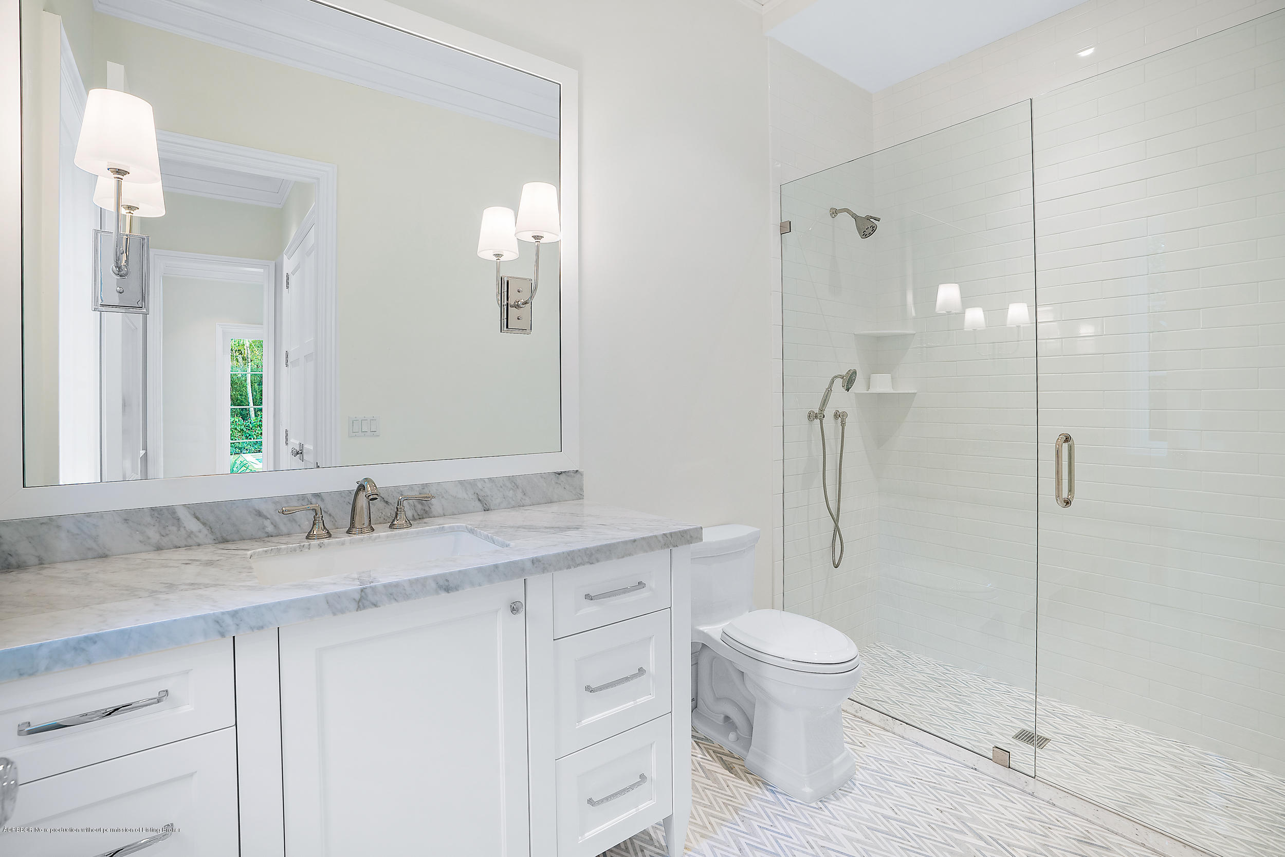 140 Kings Road Palm Beach, FL 33480 - Photo 31 of 42 a bathroom with a granite countertop sink a toilet and shower