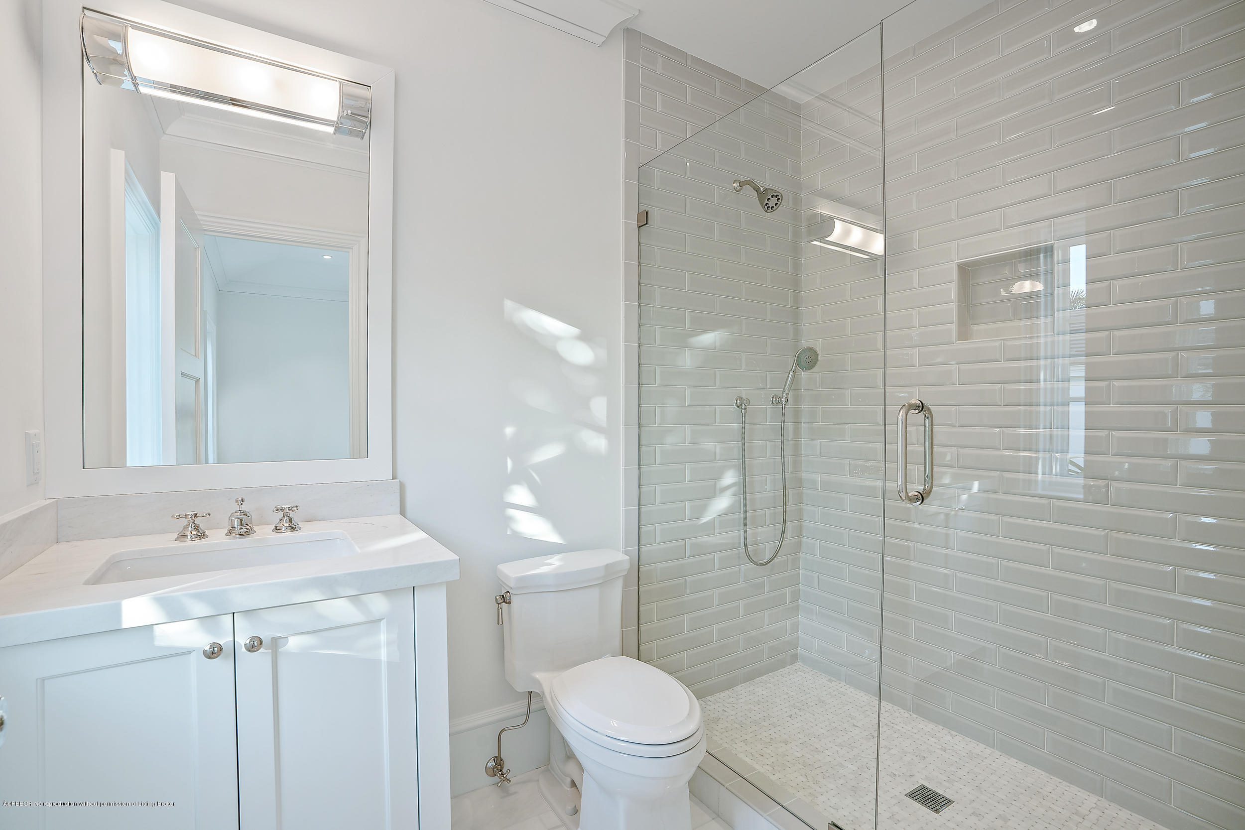 140 Kings Road Palm Beach, FL 33480 - Photo 32 of 42 a bathroom with a sink a toilet and shower