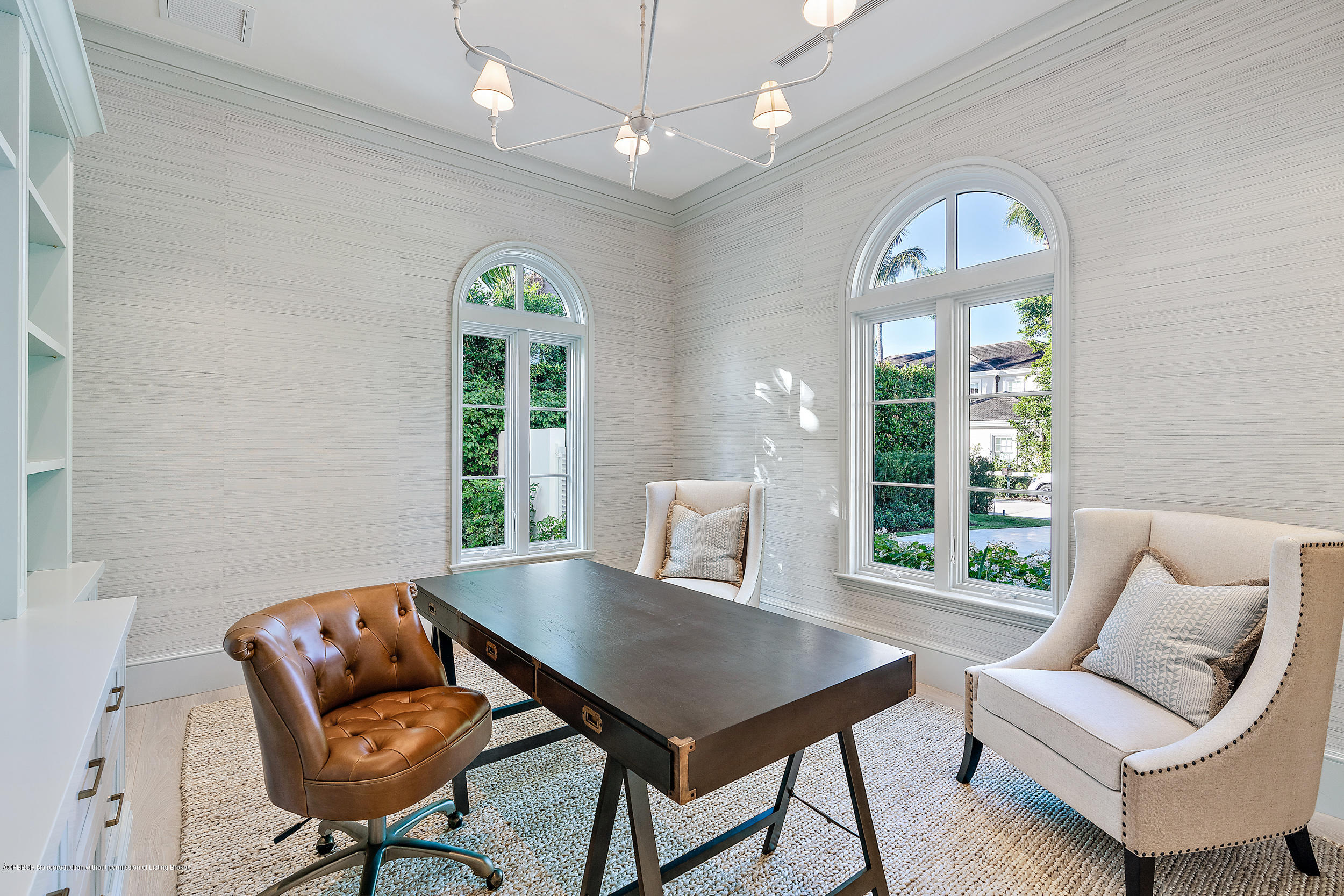 140 Kings Road Palm Beach, FL 33480 - Photo 35 of 42 a view of a livingroom with a couch and a large window