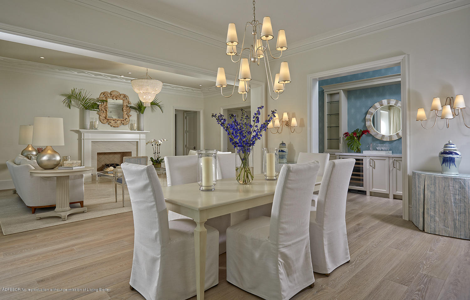 140 Kings Road Palm Beach, FL 33480 - Photo 36 of 42 a view of a dining room with furniture and chandelier