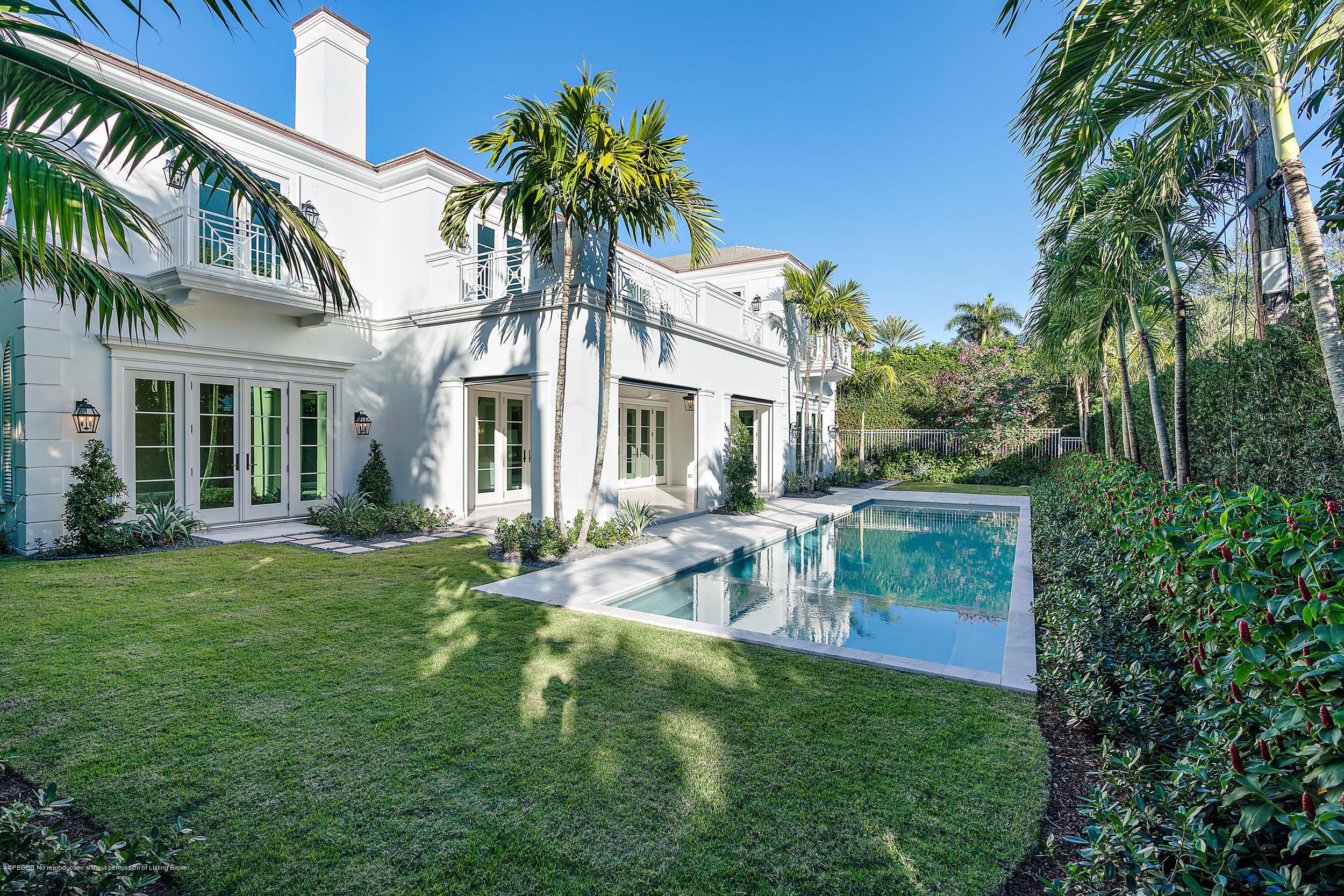 140 Kings Road Palm Beach, FL 33480 - Photo 37 of 42 a front view of house with yard and outdoor seating