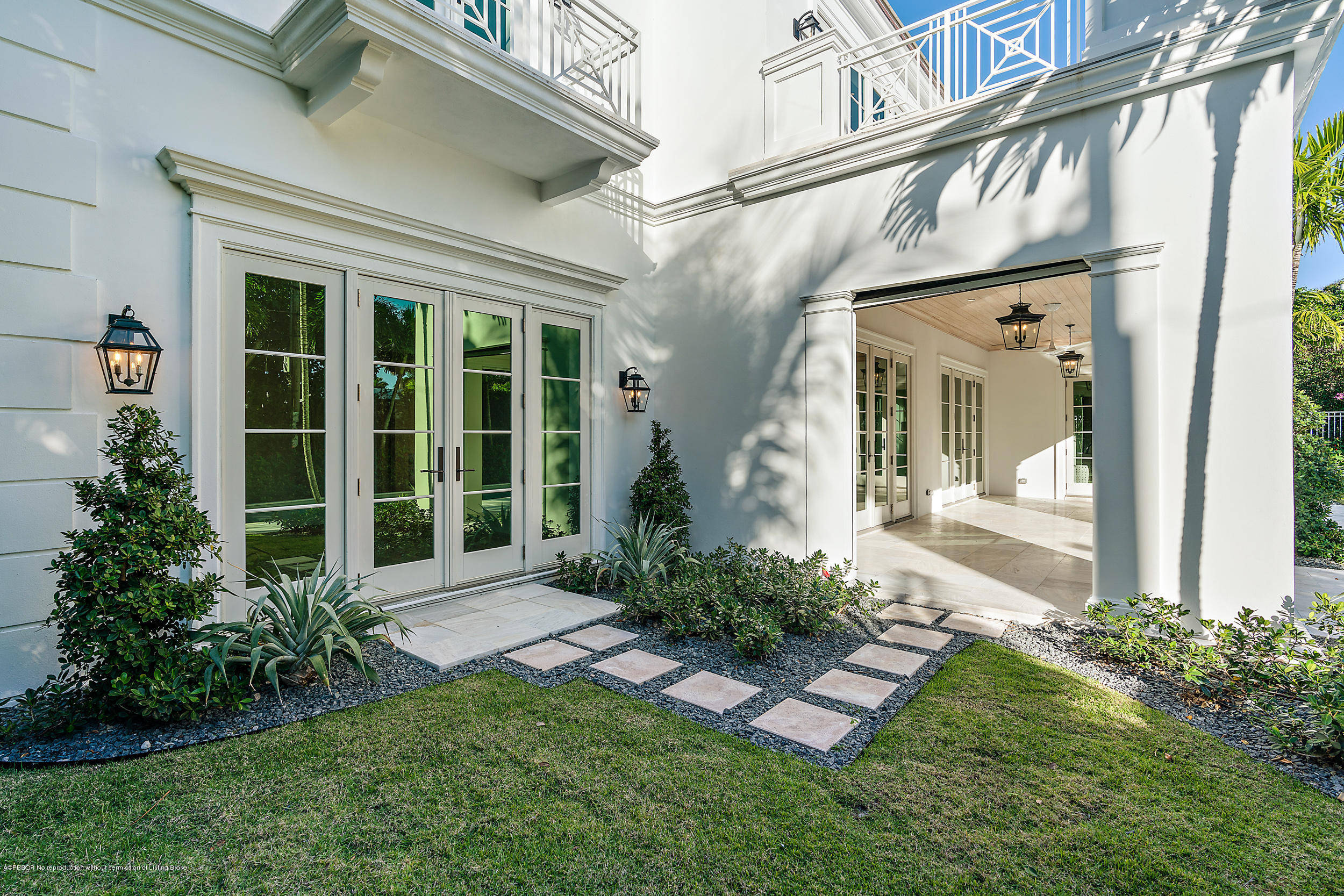 140 Kings Road Palm Beach, FL 33480 - Photo 8 of 42 a front view of a house with garden