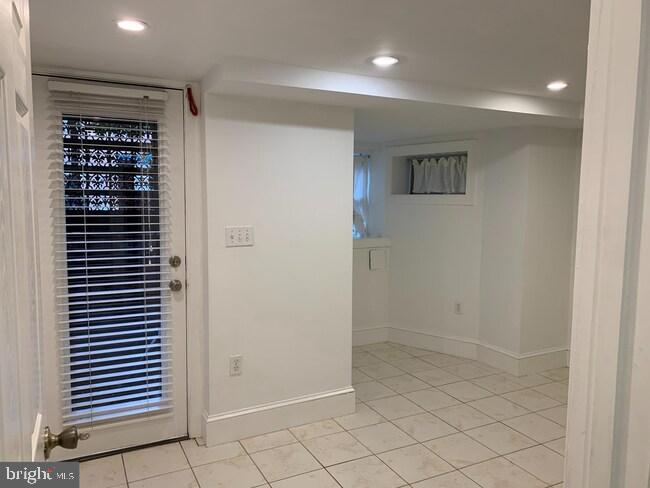 612 C Street Southeast Washington, DC 20003 - Photo 15 of 19 Bright and airy entryway with tiled floors.