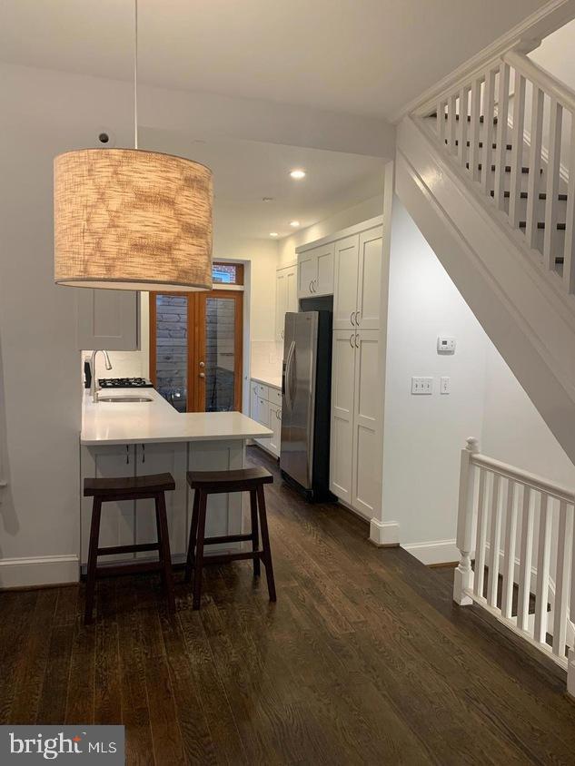 612 C Street Southeast Washington, DC 20003 - Photo 5 of 19 Modern kitchen with elegant lighting.