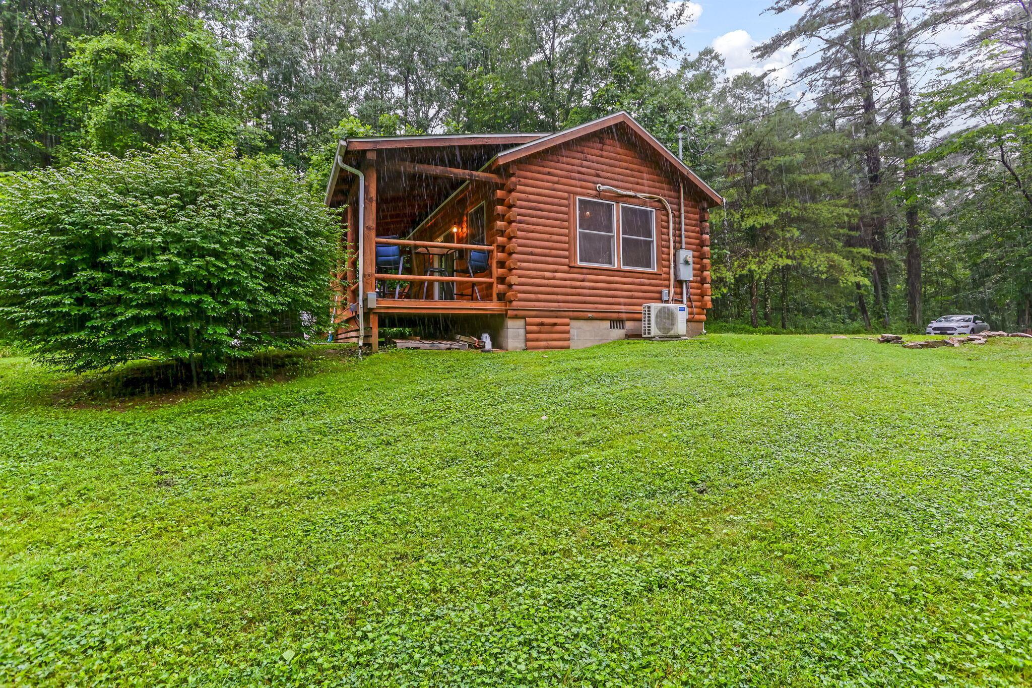 14879 Wolfe-Bennett Road Nelsonville, OH 45764 - Photo 25 of 31 Side of Log Home