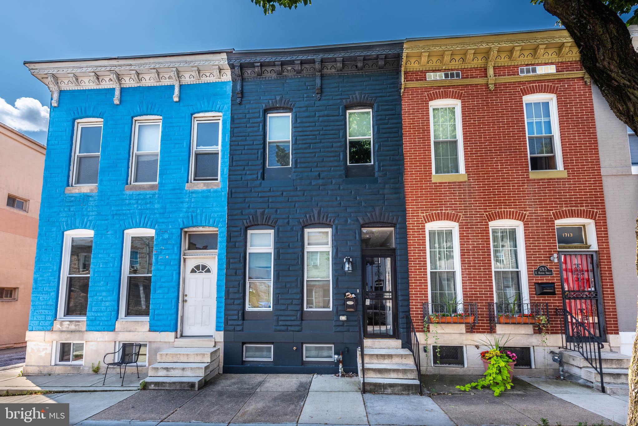 1715 East Oliver Street Baltimore, MD 21213 - Photo 30 of 30 a front view of a building with many windows