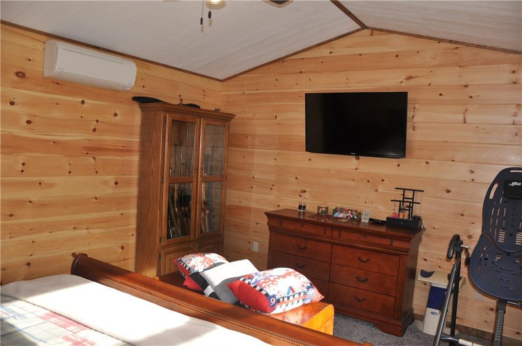 491 Ridge Road Plymouth, ME 04969 - Photo 17 of 35 First Floor Master Bedroom Vaulted...