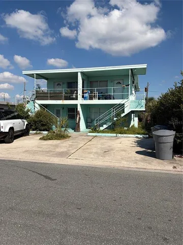 a view of pool with outdoor seating