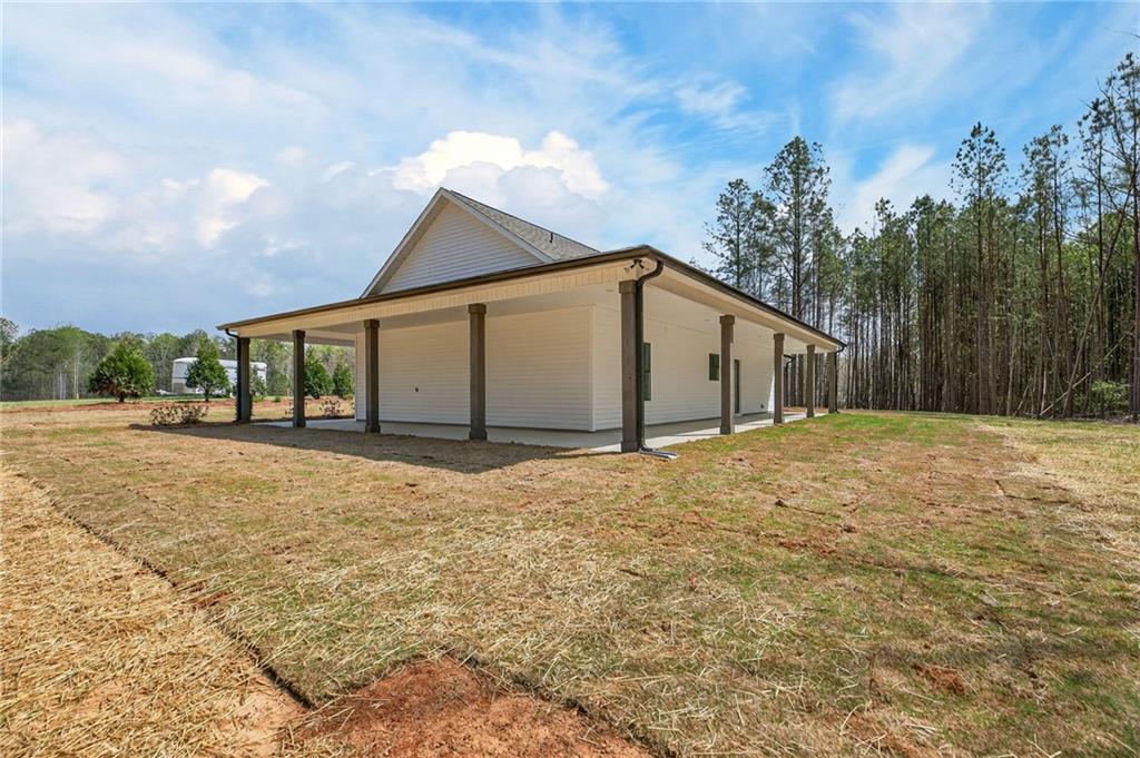 3512-2 Vinson Mountain Road Rockmart, GA 30153 - Photo 43 of 59 a view of a house with a yard