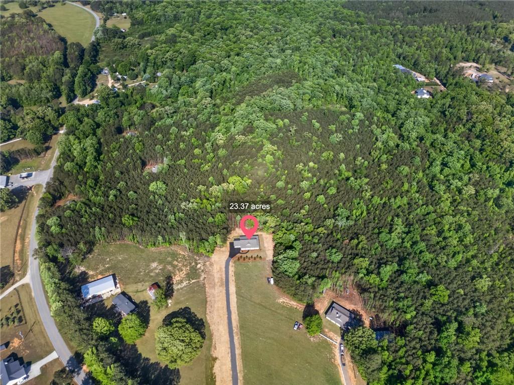 3512-2 Vinson Mountain Road Rockmart, GA 30153 - Photo 53 of 59 an aerial view of residential house with outdoor space and trees around