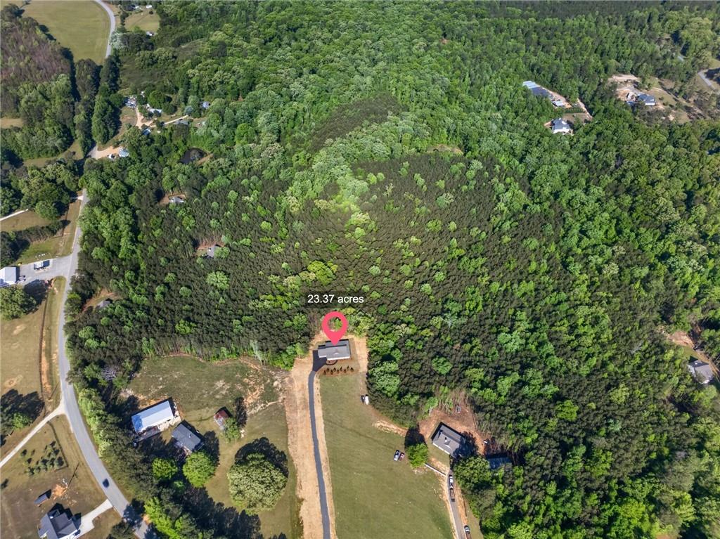 3512-2 Vinson Mountain Road Rockmart, GA 30153 - Photo 54 of 59 an aerial view of a house with a yard and lake view