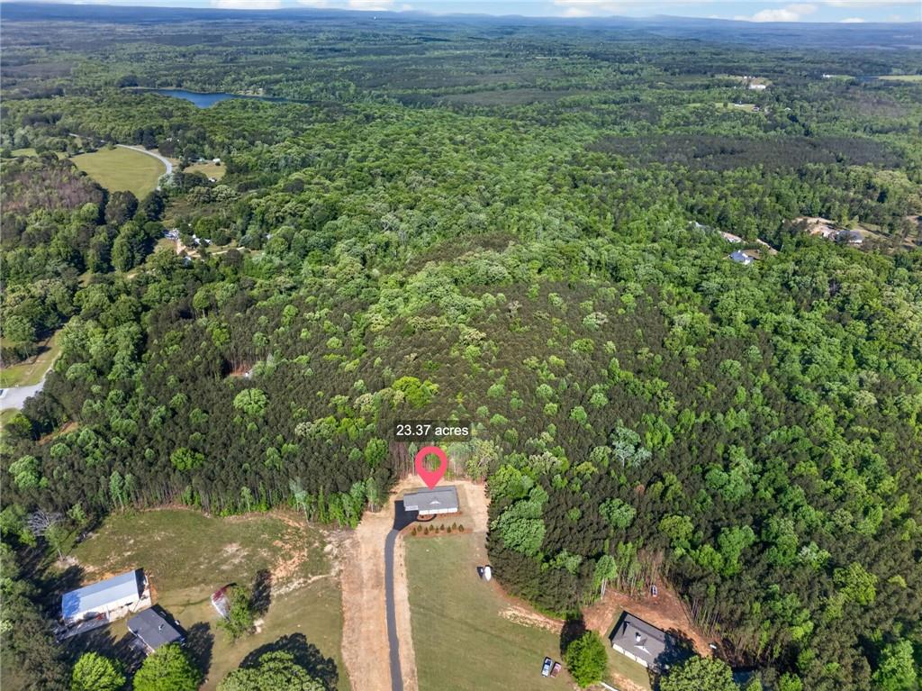3512-2 Vinson Mountain Road Rockmart, GA 30153 - Photo 56 of 59 a view of a green yard with large trees