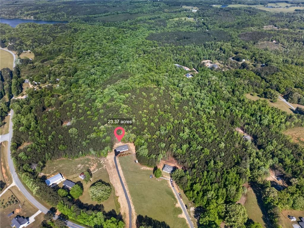3512-2 Vinson Mountain Road Rockmart, GA 30153 - Photo 57 of 59 an aerial view of a house with a yard basket ball court and outdoor seating