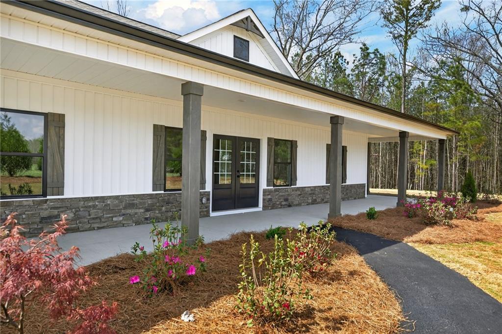 3512-2 Vinson Mountain Road Rockmart, GA 30153 - Photo 6 of 59 a view of a house with a patio