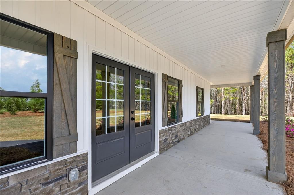 3512-2 Vinson Mountain Road Rockmart, GA 30153 - Photo 9 of 59 a view of an entryway with wooden floor and windows
