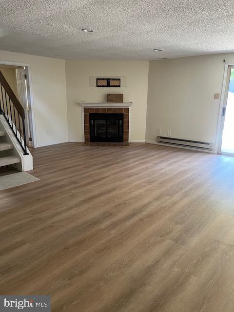 20 Lantern Lane Chesterbrook, PA 19087 - Photo 15 of 22 a view of kitchen and empty room with wooden floor