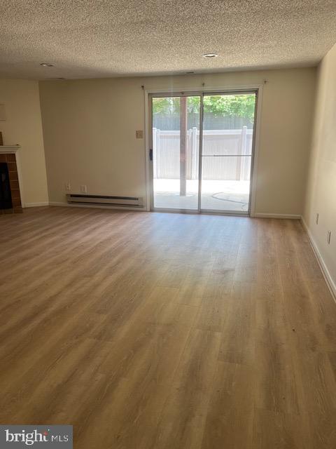 20 Lantern Lane Chesterbrook, PA 19087 - Photo 16 of 22 an empty room with wooden floor and windows