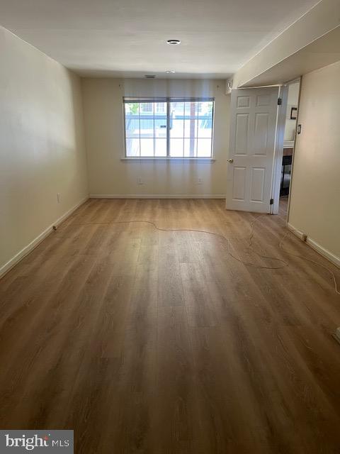 20 Lantern Lane Chesterbrook, PA 19087 - Photo 18 of 22 an empty room with wooden floor and windows
