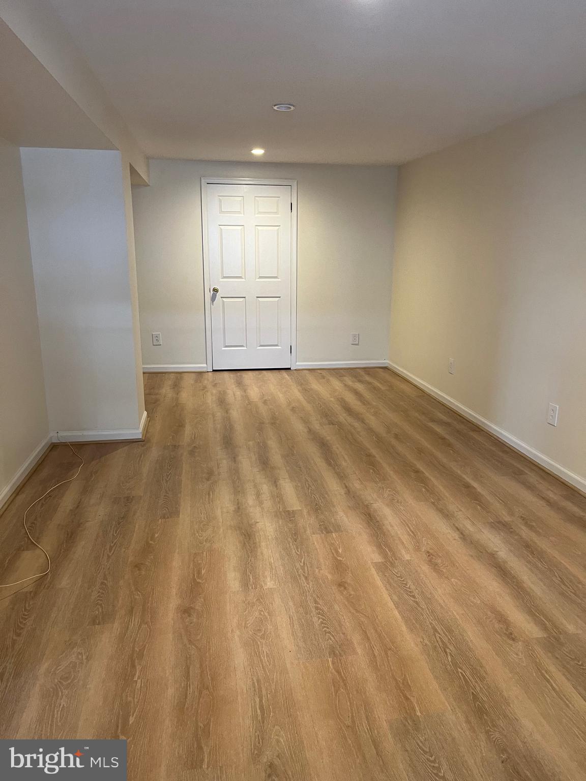 20 Lantern Lane Chesterbrook, PA 19087 - Photo 19 of 22 a view of empty room with wooden floor