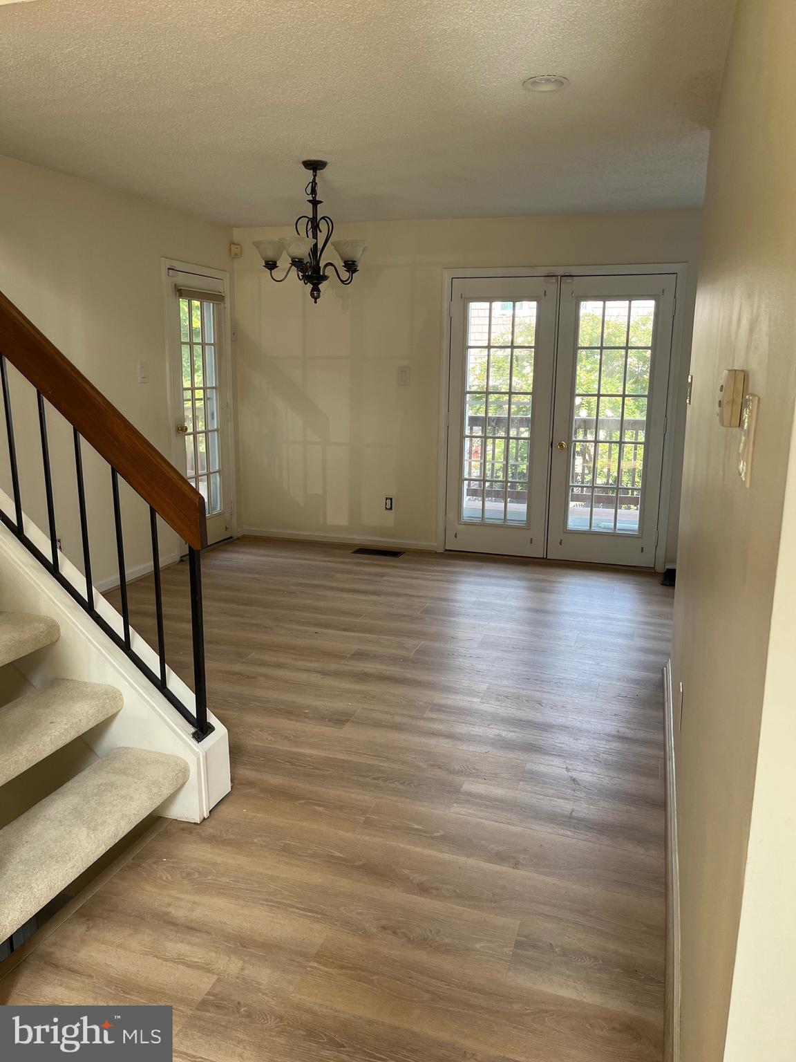 20 Lantern Lane Chesterbrook, PA 19087 - Photo 4 of 22 a view of a room with wooden floor and fan