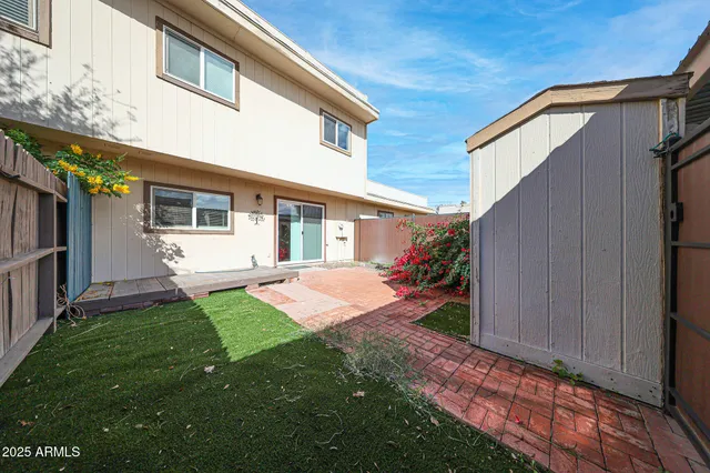 a front view of a house with an outdoor space