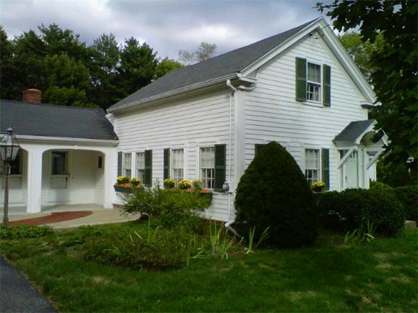 401 Ipswich Road Boxford, MA 01921 - Photo 1 of 1 a front view of a house with a garden